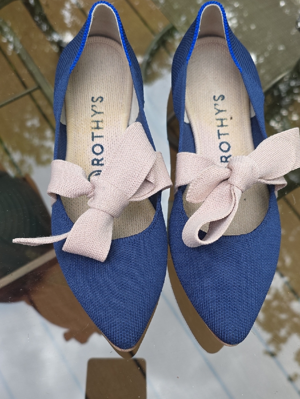 Rothy's Navy Pointed Flats with Blush Bow Accent